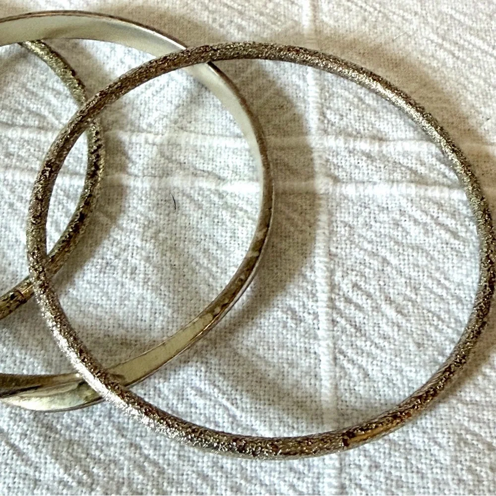 Set of 4 Silver Tone Bangle Bracelets to stack/layer